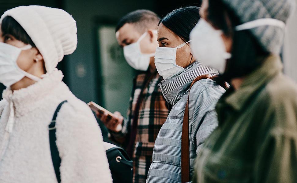 Traveling people wearing face mask in a covid pandemic in crowd, public or airport border with passport or travel restrictions. Foreigners wearing protection to prevent the spread of diseases abroad.